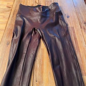Spanx Faux Leather Leggings in burgundy (size small)